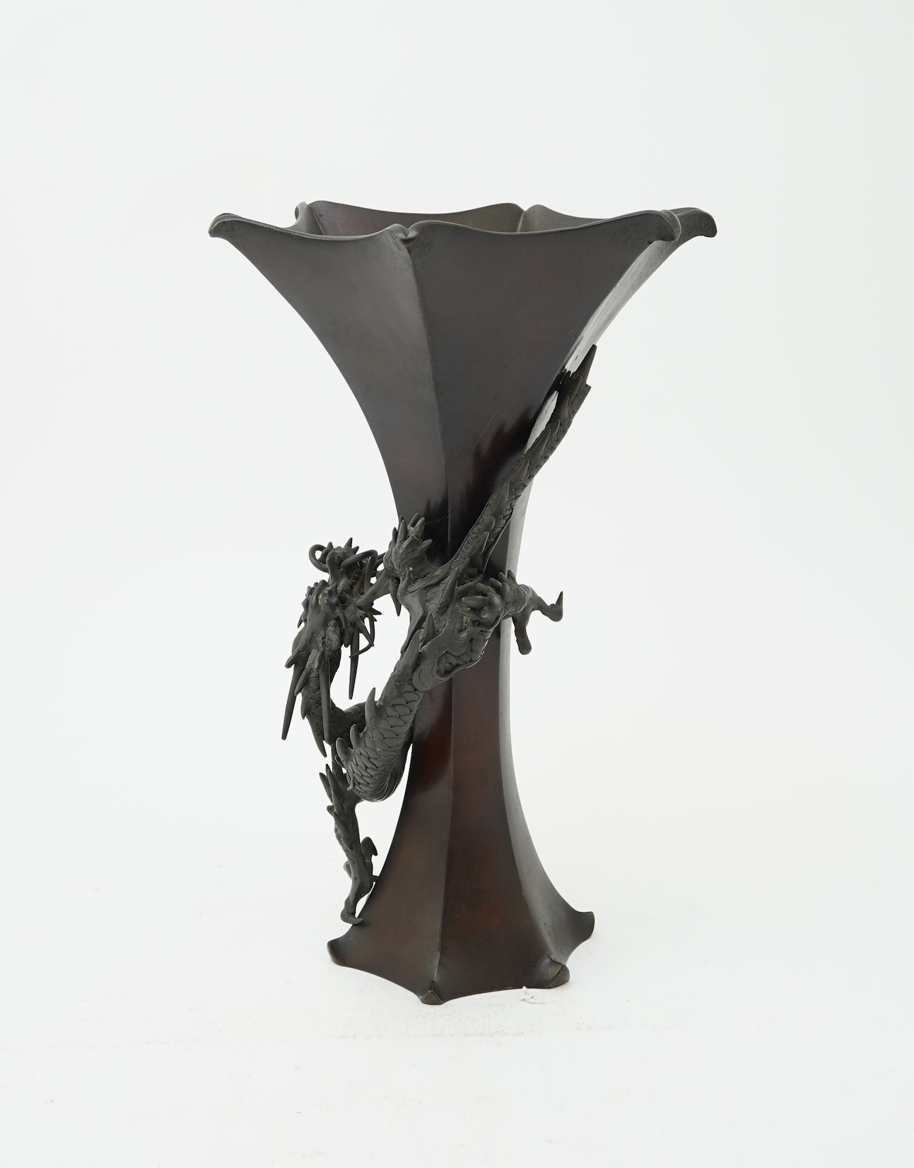 A Japanese bronze 'dragon' hexagonal beaker vase, Meiji period